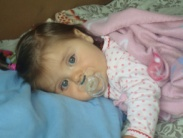Bébé sur oreiller en sarrasin